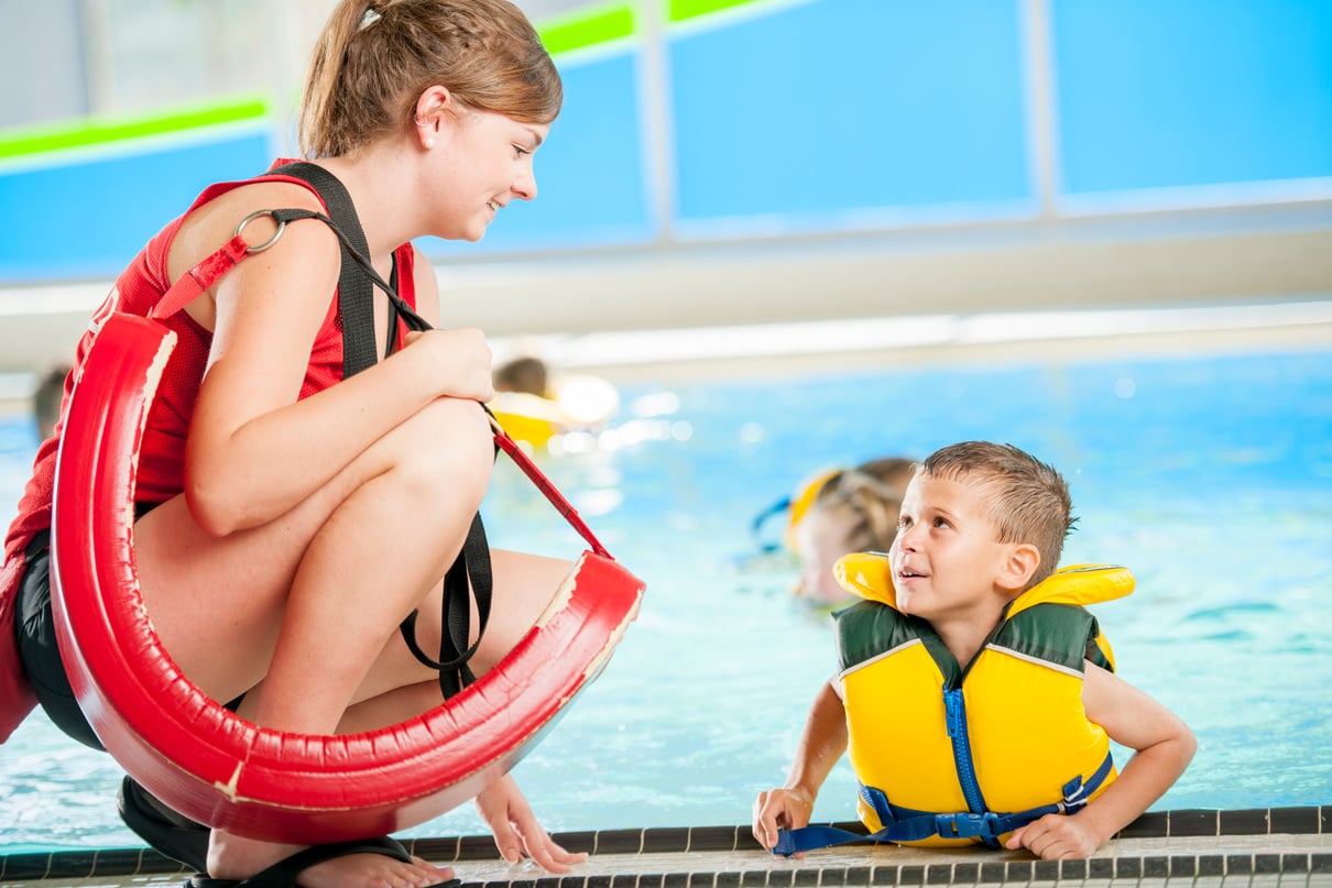 Lifeguard Talking to Child